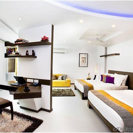 Melange Astris Bangalore Quarto foto